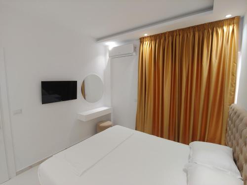 Postel nebo postele na pokoji v ubytování Hotel ZEKA