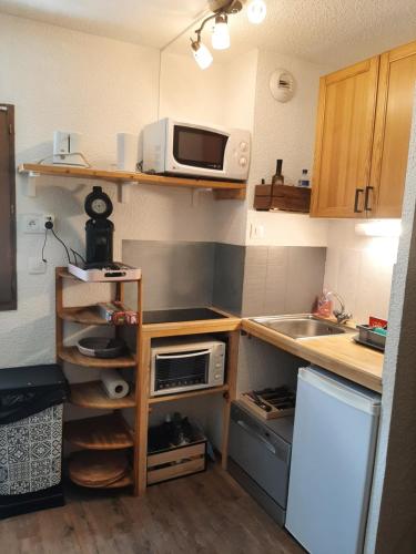 Photo de la galerie de l'établissement Studio FLOCON 18m2 en RDC, aux Carroz d'Arâches