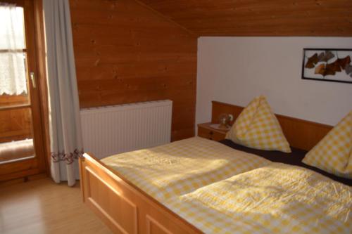 Ein Bett oder Betten in einem Zimmer der Unterkunft Das Glaagut - Familie Hain