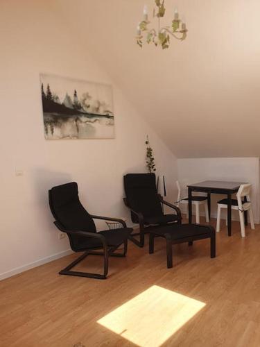 Ruang duduk di Loft Sympa au calme