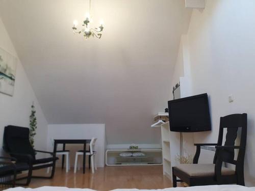 Televisyen dan/atau pusat hiburan di Loft Sympa au calme