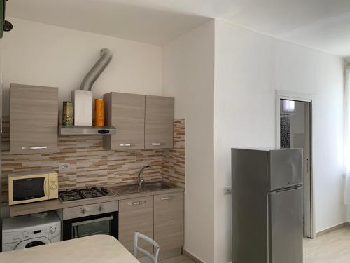 Кухня или мини-кухня в Naviglio Milano Apartment
