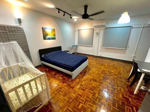 Tempat tidur dalam kamar di 6-12Pax The Premium House 2 - Heart Of Sunway