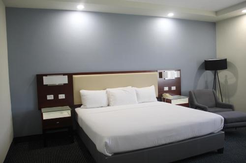 Cama ou camas em um quarto em Best Western Santorin