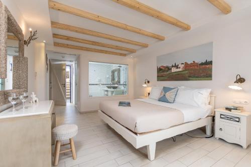 Ένα ή περισσότερα κρεβάτια σε δωμάτιο στο Naxos Island Hotel