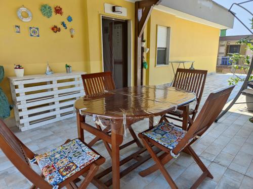 Patio alebo iná vonkajšia časť ubytovania Casa Parco Aranci