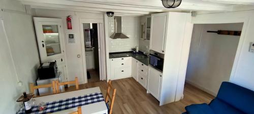Kuchyň nebo kuchyňský kout v ubytování 3 Apartamento tipo estudio ideal para tus vacaciones
