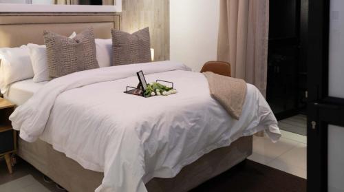 Letto o letti in una camera di The Lofts Luxury Suites