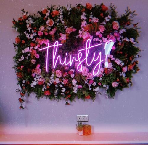 a sign that says think up on a wreath of flowers at The Parr’s Bank Hotel in Warrington