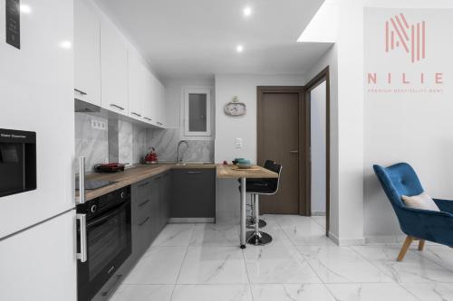 Kuchyň nebo kuchyňský kout v ubytování Penthouse Level 7, Nilie Hospitality MGMT
