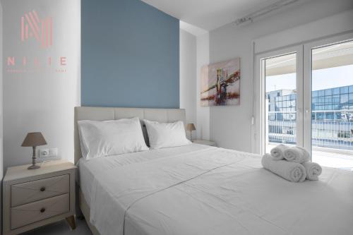 Postel nebo postele na pokoji v ubytování Penthouse Level 7, Nilie Hospitality MGMT