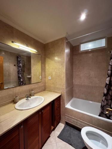 Ένα μπάνιο στο Beach Apartment