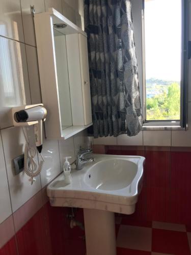 Koupelna v ubytování HOTEL SARDA