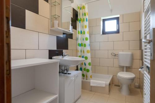 Kúpeľňa v ubytovaní Apartments Patar