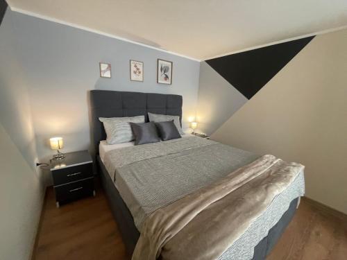 Postel nebo postele na pokoji v ubytování Duplex Oasis Ada