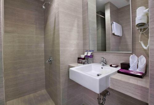 Koupelna v ubytování Quest Hotel Balikpapan by ASTON