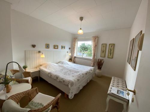 Postel nebo postele na pokoji v ubytování Klithjem Badehotel