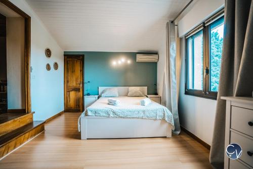 Ένα ή περισσότερα κρεβάτια σε δωμάτιο στο Superbe Villa avec Piscine et vue sur le Village