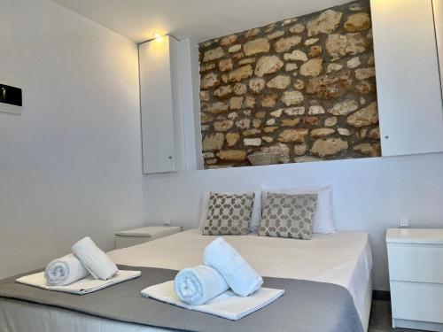Katil atau katil-katil dalam bilik di The Beach House - Apartments & Studios