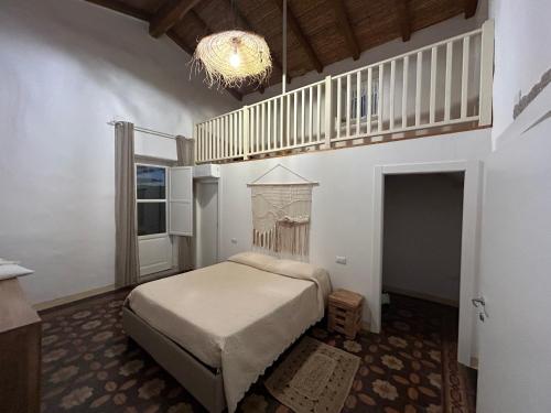 Postel nebo postele na pokoji v ubytování Villa Aromata