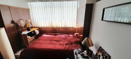 Postel nebo postele na pokoji v ubytování Luxor Studio 1B