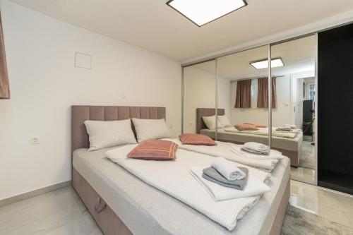 Ένα ή περισσότερα κρεβάτια σε δωμάτιο στο Villa Noemi