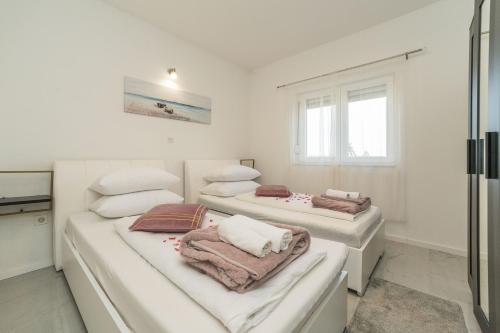 Ένα ή περισσότερα κρεβάτια σε δωμάτιο στο Villa Noemi