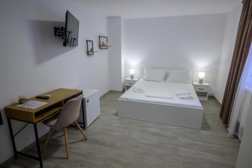 Postel nebo postele na pokoji v ubytování Vila RD