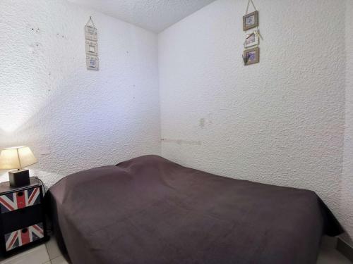 Ένα ή περισσότερα κρεβάτια σε δωμάτιο στο Appartement Carnac, 2 pièces, 4 personnes - FR-1-477-236