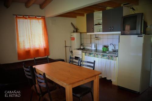 Kuchyň nebo kuchyňský kout v ubytování Cabañas El Retiro, un rincón en la montaña