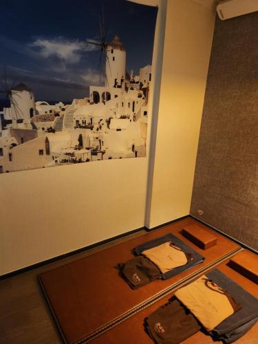 a room with a window with a view of a city at GoodDay Jjimjilbang in Incheon