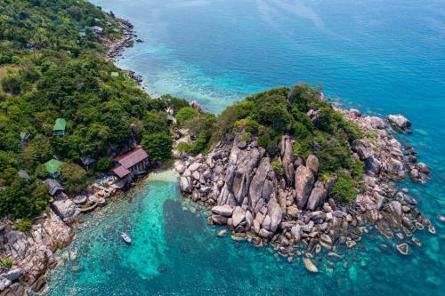 an aerial view of a rocky island in the ocean at Tao Thong Villa 2 in Ko Tao
