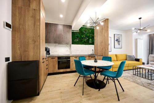 Køkken eller tekøkken på Infinity Summer Crib Beach Resort - parking