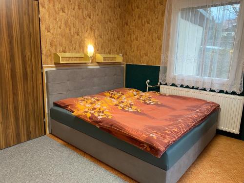 Postel nebo postele na pokoji v ubytování Apartmány Ditz