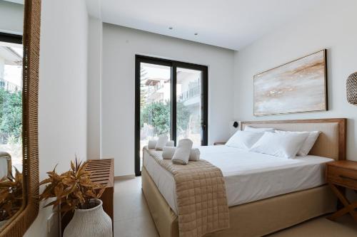 Postel nebo postele na pokoji v ubytování Melior Luxury Villas
