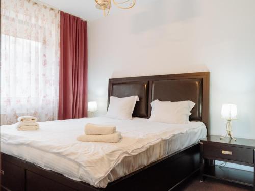 Llit o llits en una habitació de Panoramic Loft Colina Marei