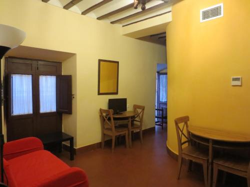 Un lugar para sentarse en Apartamentos Turísticos El Losal