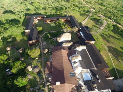 an overhead view of a building in a field at Seronera Wildlife Lodge in Serengeti National Park