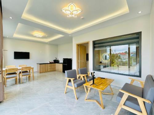 TV a/nebo společenská místnost v ubytování Sunflower Hotel & Resort