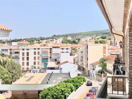 a view of a city from a building at Alhattic in Alhaurín el Grande