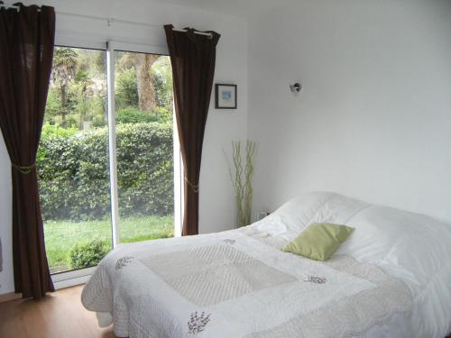 Llit o llits en una habitació de La Palibe