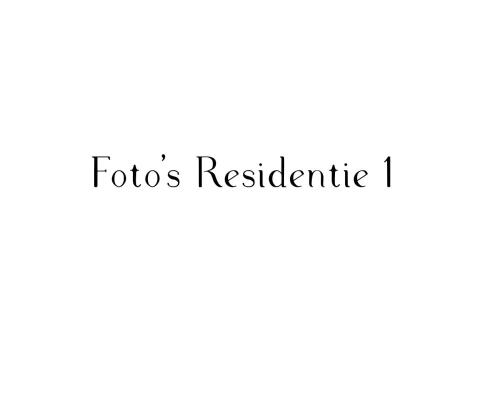 una caja de texto con las palabras fotos relectricas en Residenties en bungalow Royal Domburg, en Domburg