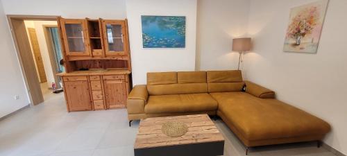 a living room with a couch and a table at Wohnung in Datteln in Datteln