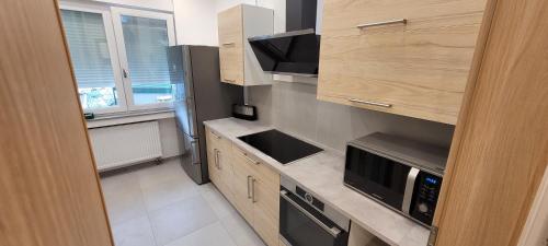 a kitchen with a sink and a stove top oven at Wohnung in Datteln in Datteln
