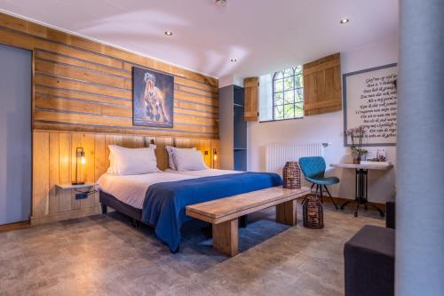 מיטה או מיטות בחדר ב-Hotel Herberg de Lindehoeve