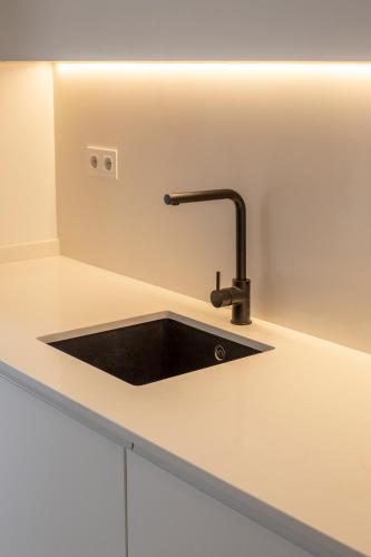 Cucina o angolo cottura di Guest House Jacarandá Faro