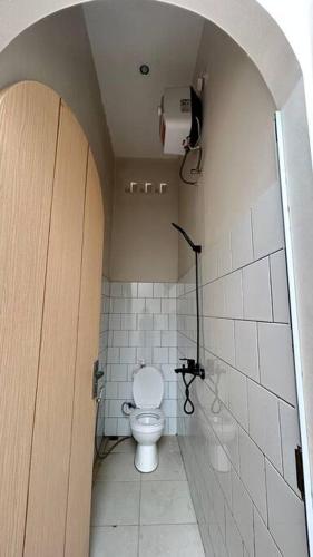 Phòng tắm tại homestay Bumisarehat