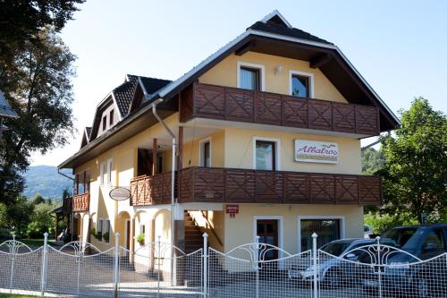 a building with a fence in front of it at Vila Ana Generoes Bled in Bled