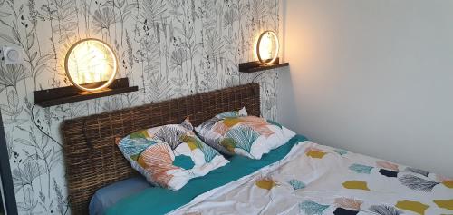 Postel nebo postele na pokoji v ubytování Appartement 2 chambres