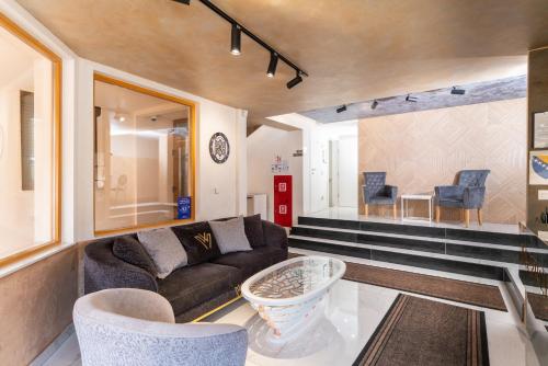 Area soggiorno di Ornament Hotel and Apartments